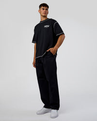 Man wearing Pressure is Privilege Oversized Tee - Black-White | Model:Jackson | Size:L | Thumbnail Index: 5