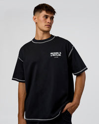 Man wearing Pressure is Privilege Oversized Tee - Black-White | Model:Jackson | Size:L | Thumbnail Index: 1