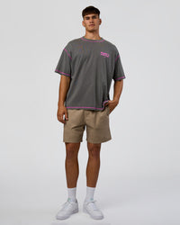 Man wearing Pressure is Privilege Oversized Tee - Dark Storm Washed-Ultra Fuchsia | Model:Jackson | Size:L | Thumbnail Index: 8
