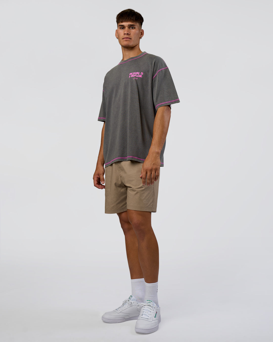 Man wearing Pressure is Privilege Oversized Tee - Dark Storm Washed-Ultra Fuchsia | Model:Jackson | Size:L - view 6
