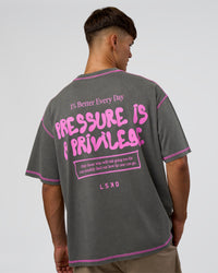 Man wearing Pressure is Privilege Oversized Tee - Dark Storm Washed-Ultra Fuchsia | Model:Jackson | Size:L | Thumbnail Index: 1