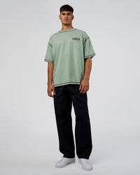 Man wearing Pressure is Privilege Oversized Tee - Iceberg Green-Black | Model:Jackson | Size:L | Thumbnail Index: 7