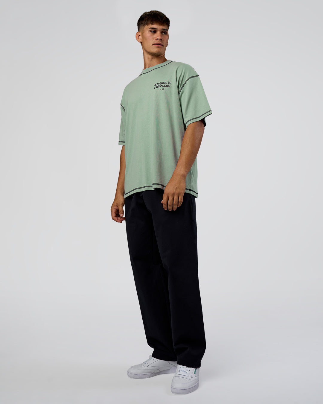 Man wearing Pressure is Privilege Oversized Tee - Iceberg Green-Black | Model:Jackson | Size:L - view 6