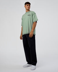 Man wearing Pressure is Privilege Oversized Tee - Iceberg Green-Black | Model:Jackson | Size:L | Thumbnail Index: 5