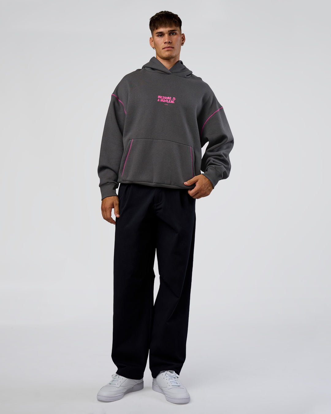 Man wearing Pressure is Privilege Oversized Hoodie - Dark Storm-Ultra Fuchsia | Model:Jackson | Size:L - view 6