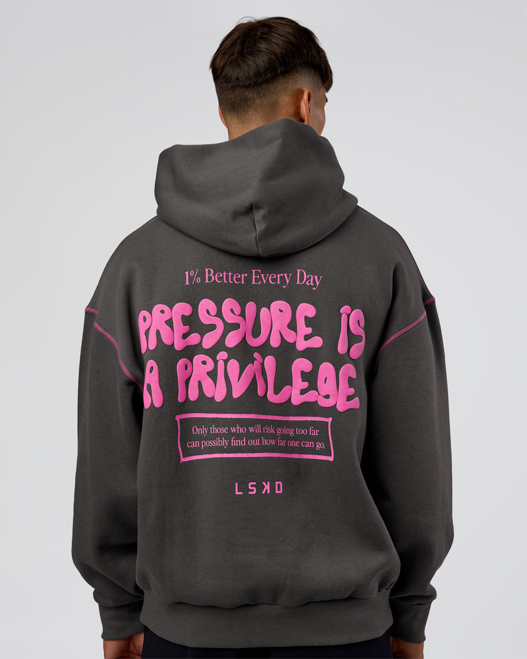 Man wearing Pressure is Privilege Oversized Hoodie - Dark Storm-Ultra Fuchsia | Model:Jackson | Size:L - view 2