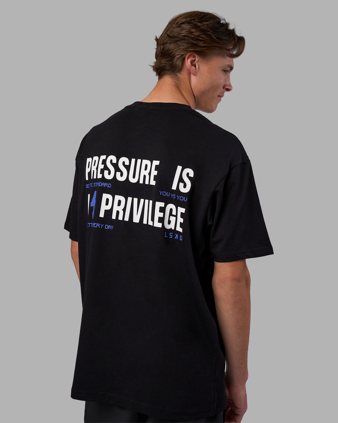 Man wearing Pressure is a Privilege FLXCotton Oversized Tee - Black-Power Cobalt | Model:Brandon | Size:L - view 11