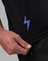 Man wearing Pressure is a Privilege FLXCotton Oversized Tee - Black-Power Cobalt | Model:Brandon | Size:L | Thumbnail Index: 3