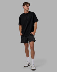 Man wearing Pressure is a Privilege FLXCotton Oversized Tee - Black-Power Cobalt | Model:Brandon | Size:L | Thumbnail Index: 2