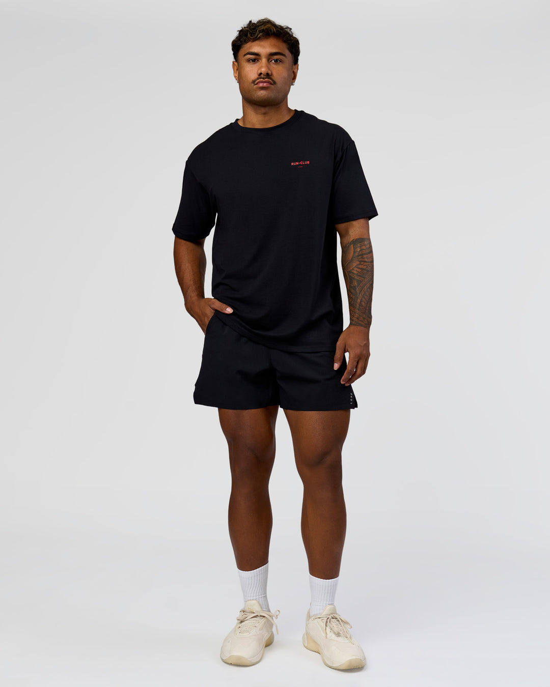 Man wearing RUN CLUB FLXCotton Tee Oversize - Black-Scarlet | Model:Xav | Size:L  - view 6