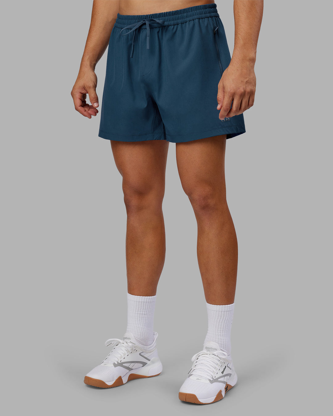 Man wearing Rep 5" Performance Short - Indigo | Model:Jackson | Size:L - view 6