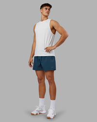 Man wearing Rep 5" Performance Short - Indigo | Model:Jackson | Size:L | Thumbnail Index: 1