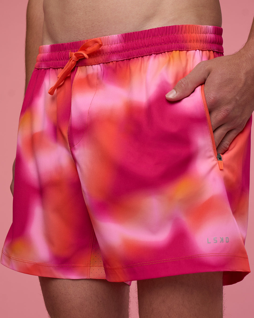 Man wearing Rep 5" Performance Short - Pink Glow Print | Model:Brandon | Size:L - view 2