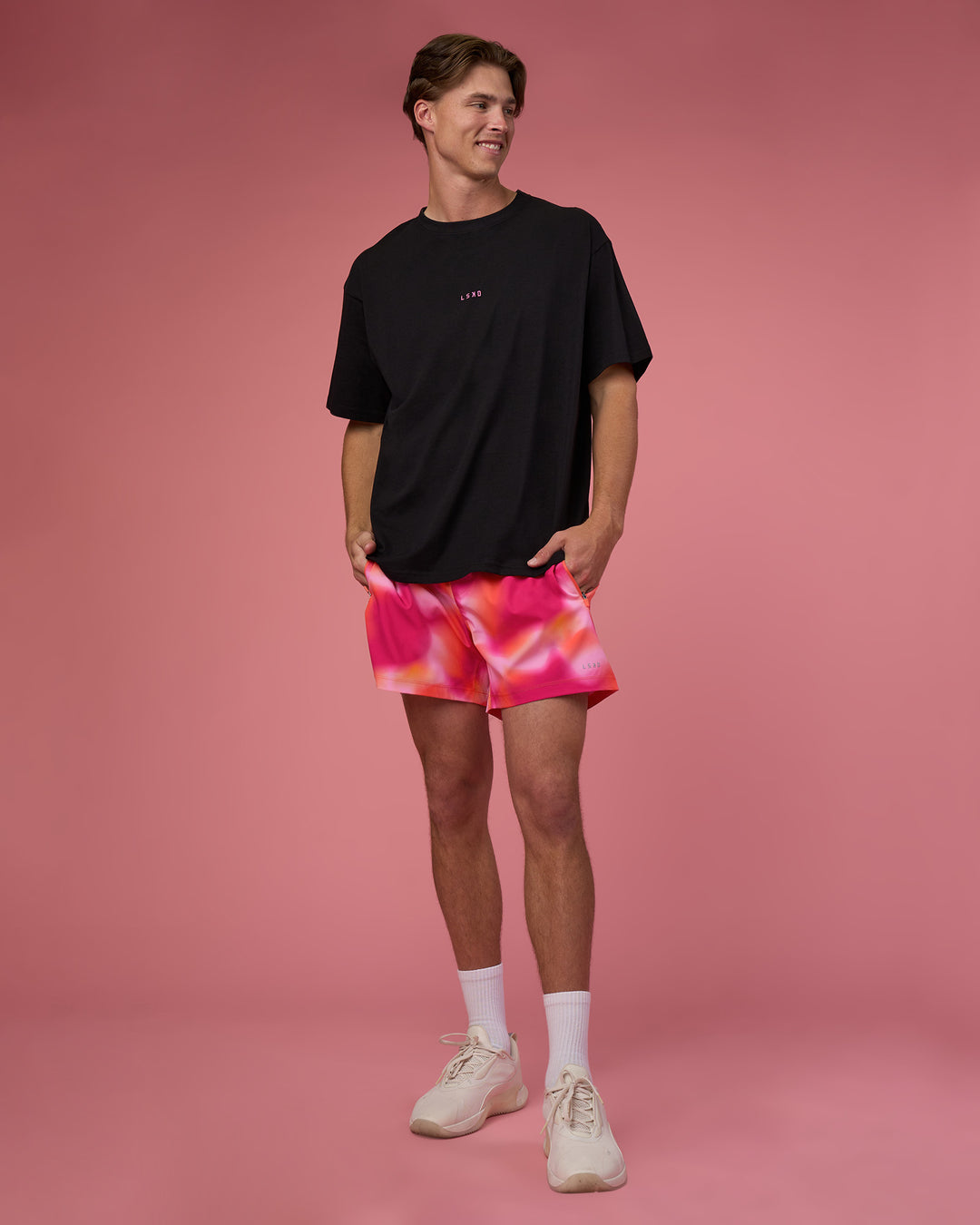 Man wearing Rep 5" Performance Short - Pink Glow Print | Model:Brandon | Size:L - view 3