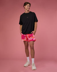 Man wearing Rep 5" Performance Short - Pink Glow Print | Model:Brandon | Size:L | Thumbnail Index: 2