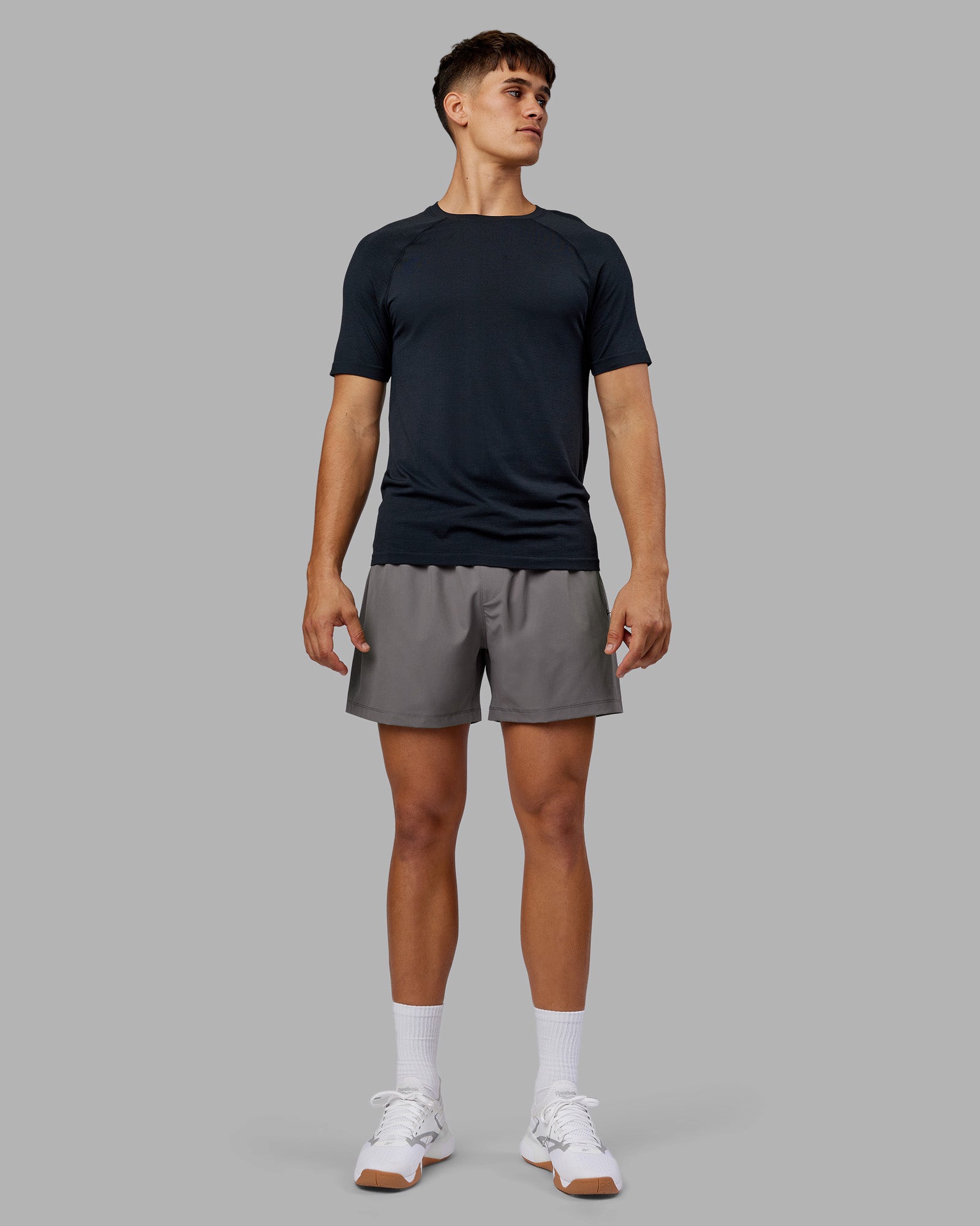 Man wearing Rep 5" Performance Short - Storm Front | Model:Jackson | Size:L