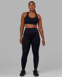 Woman wearing Rep Ultra High-Rise Full Length Legging Pockets - Black-White | Model:Sierra | Size:L | Thumbnail Index: 4