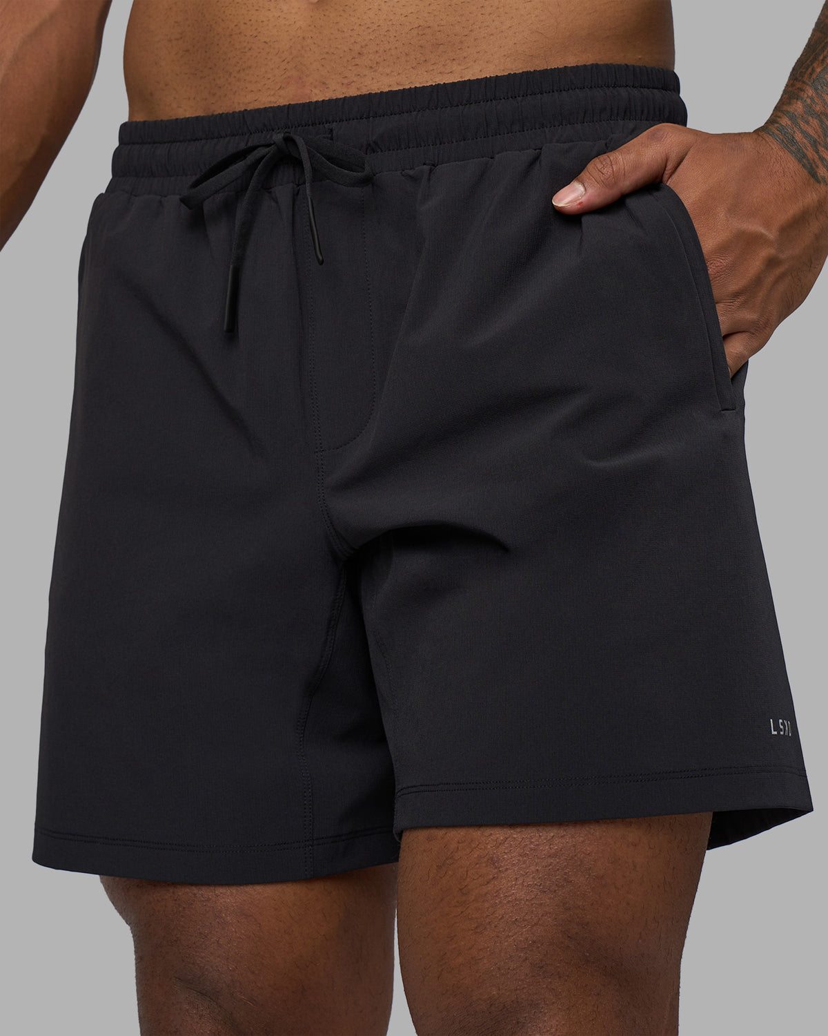 Man wearing Rep TRD Ripstop 7" Training Short - Black | Model:Xav | Size:L