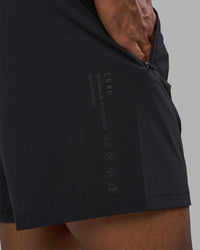 Man wearing Rep TRD Ripstop 7" Training Short - Black | Model:Xav | Size:L | Thumbnail Index: 2
