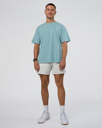 Man wearing Research Department FLXCotton Oversized Tee - Smoke Blue | Model:Nikola | Size:L | Thumbnail Index: 5