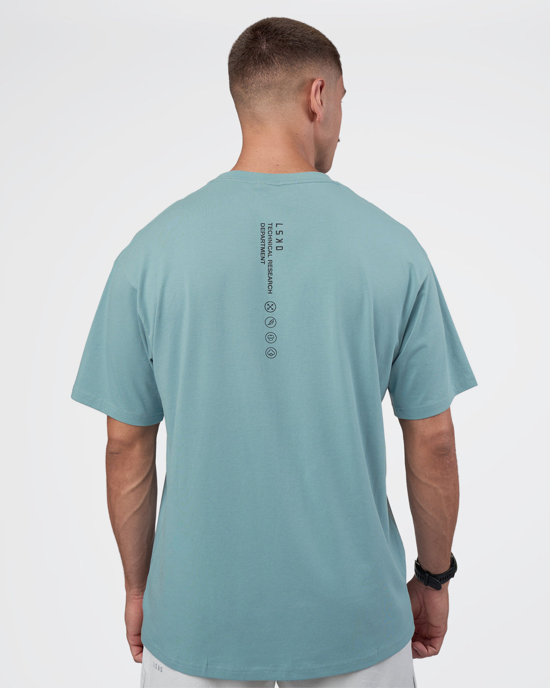 Man wearing Research Department FLXCotton Oversized Tee - Smoke Blue | Model:Nikola | Size:L - view 8