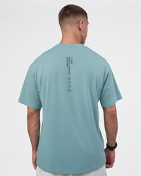 Man wearing Research Department FLXCotton Oversized Tee - Smoke Blue | Model:Nikola | Size:L | Thumbnail Index: 7