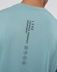 Man wearing Research Department FLXCotton Oversized Tee - Smoke Blue | Model:Nikola | Size:L | Thumbnail Index: 2