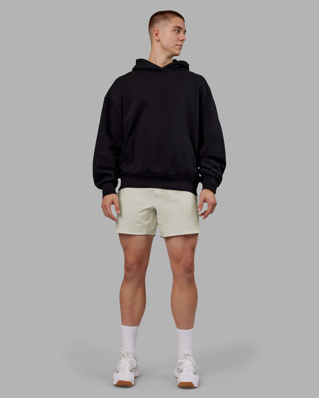 Man wearing Rise &amp; Lift Hoodie Oversized - Black-White | Model:Tom | Size:L - view 11