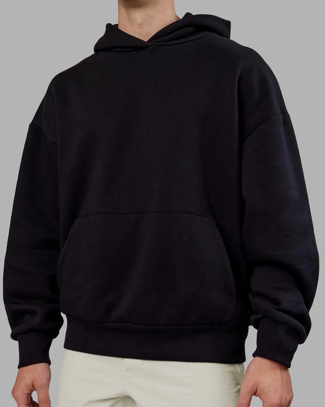 Man wearing Rise &amp; Lift Hoodie Oversized - Black-White | Model:Tom | Size:L - view 7