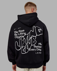 Man wearing Rise & Lift Hoodie Oversized - Black-White | Model:Tom | Size:L | Thumbnail Index: 8