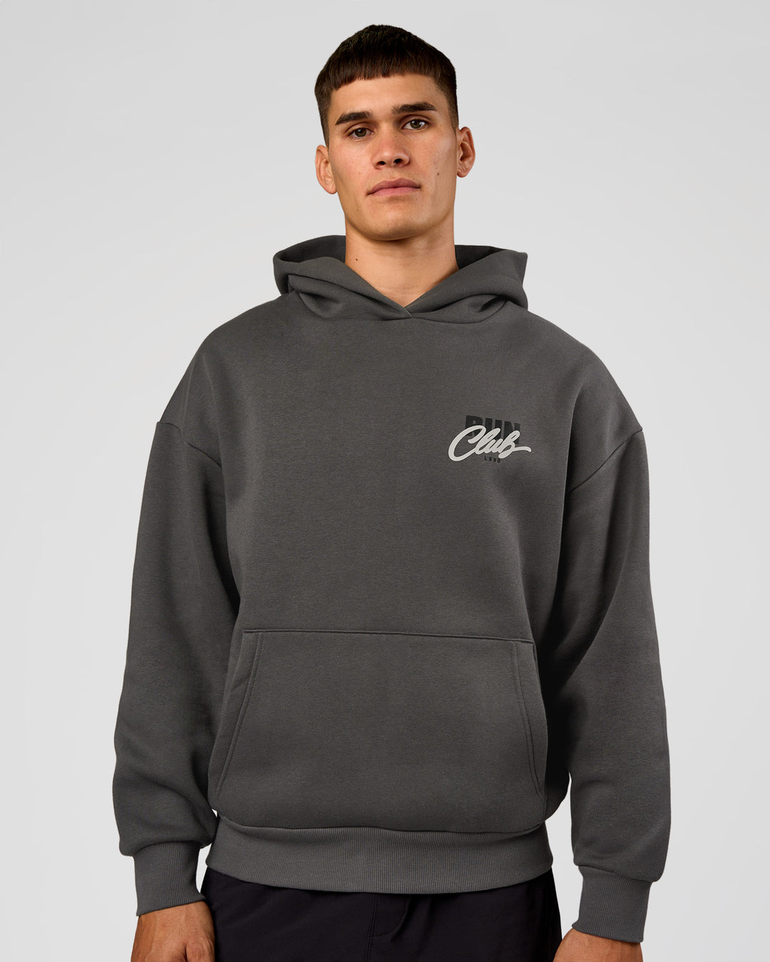 Man wearing Run Club Script Oversized Hoodie - Dark Storm-Alloy | Model:Jackson | Size:L - view 3