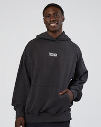 Man wearing Runner’s Unisex Oversized Hoodie - Black Washed-White | Model:Paabio | Size:L | Thumbnail Index: 8