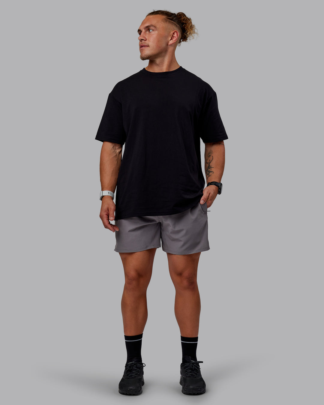 Man wearing Sara GET ÆTLA SKAL Unisex FLXCotton Tee Oversize - Black-White - view 11