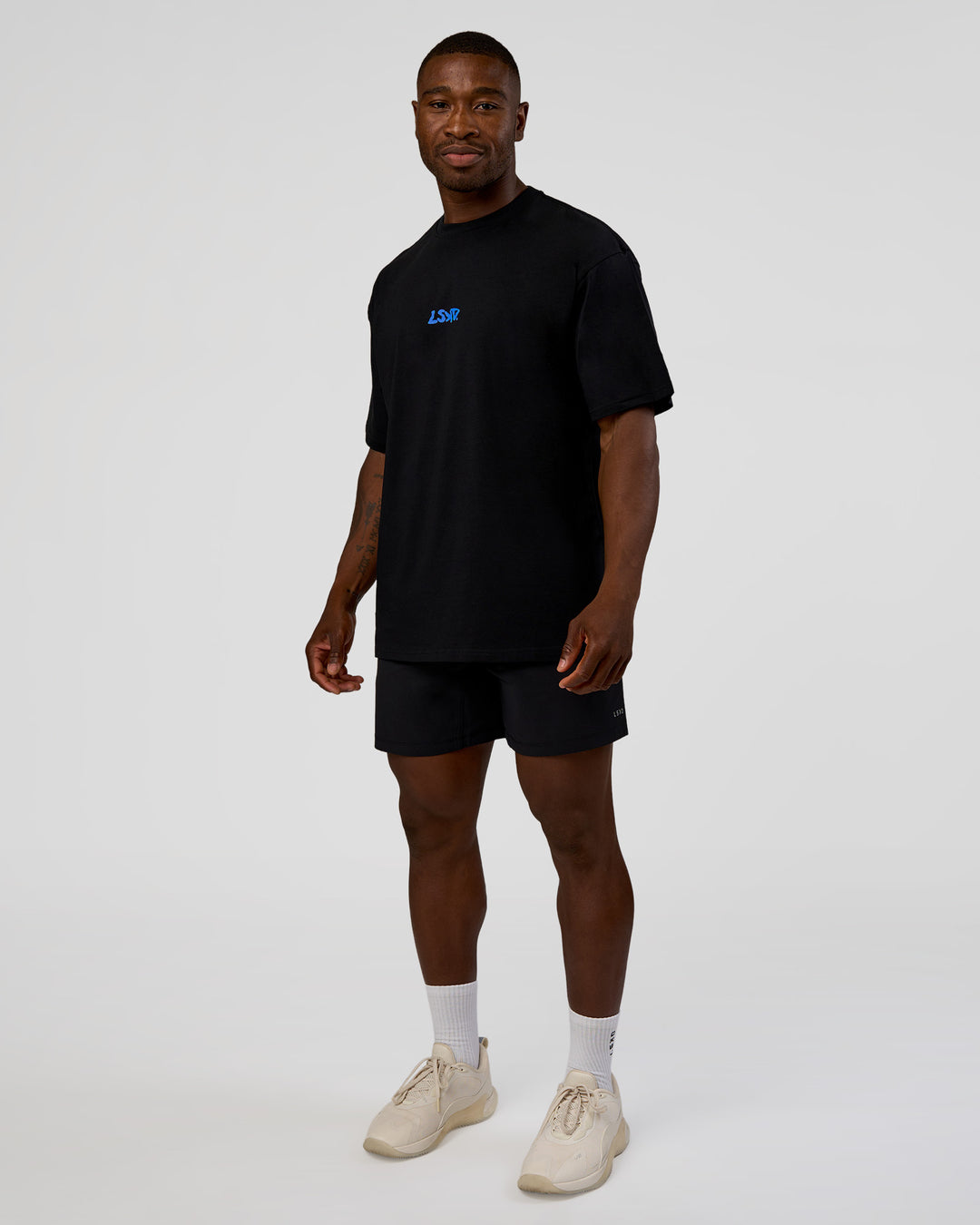 Man wearing Standard Issue FLXCotton Oversized Tee - Black-Palace Blue | Model:Sam | Size:L - view 6
