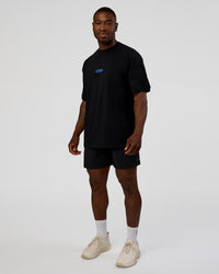 Man wearing Standard Issue FLXCotton Oversized Tee - Black-Palace Blue | Model:Sam | Size:L | Thumbnail Index: 5