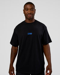 Man wearing Standard Issue FLXCotton Oversized Tee - Black-Palace Blue | Model:Sam | Size:L | Thumbnail Index: 2