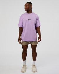 Man wearing Standard Issue FLXCotton Oversized Tee - Pale Lilac-Black | Model:Sam | Size:L | Thumbnail Index: 5