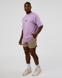 Man wearing Standard Issue FLXCotton Oversized Tee - Pale Lilac-Black | Model:Sam | Size:L | Thumbnail Index: 2