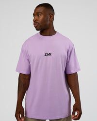 Man wearing Standard Issue FLXCotton Oversized Tee - Pale Lilac-Black | Model:Sam | Size:L | Thumbnail Index: 6