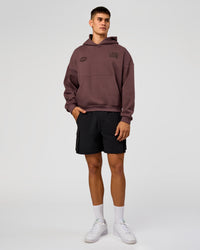 Man wearing Static Grit Unisex Boxy Hoodie - Cocoa Powder-Hot Chocolate | Model:Jackson | Size:L | Thumbnail Index: 5