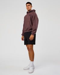 Man wearing Static Grit Unisex Boxy Hoodie - Cocoa Powder-Hot Chocolate | Model:Jackson | Size:L | Thumbnail Index: 11