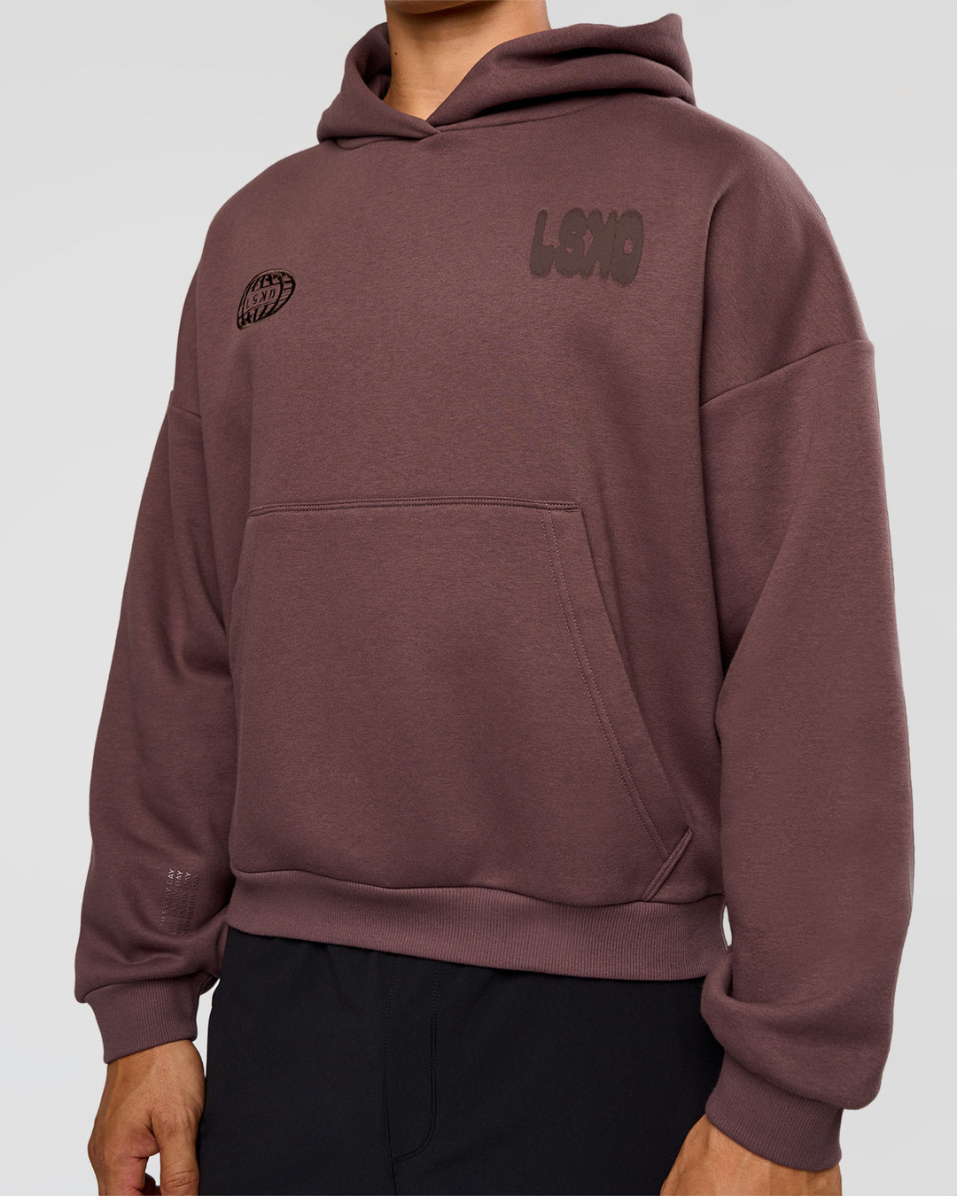 Man wearing Static Grit Unisex Boxy Hoodie - Cocoa Powder-Hot Chocolate | Model:Jackson | Size:L - view 13