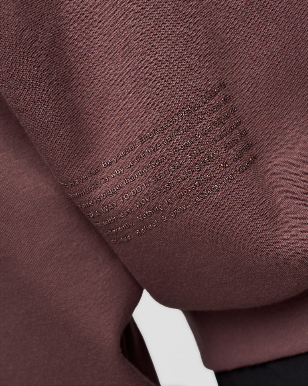 Man wearing Static Grit Unisex Boxy Hoodie - Cocoa Powder-Hot Chocolate | Model:Jackson | Size:L - view 3