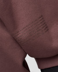 Man wearing Static Grit Unisex Boxy Hoodie - Cocoa Powder-Hot Chocolate | Model:Jackson | Size:L | Thumbnail Index: 2