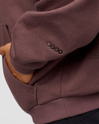 Man wearing Static Grit Unisex Boxy Hoodie - Cocoa Powder-Hot Chocolate | Model:Jackson | Size:L | Thumbnail Index: 10