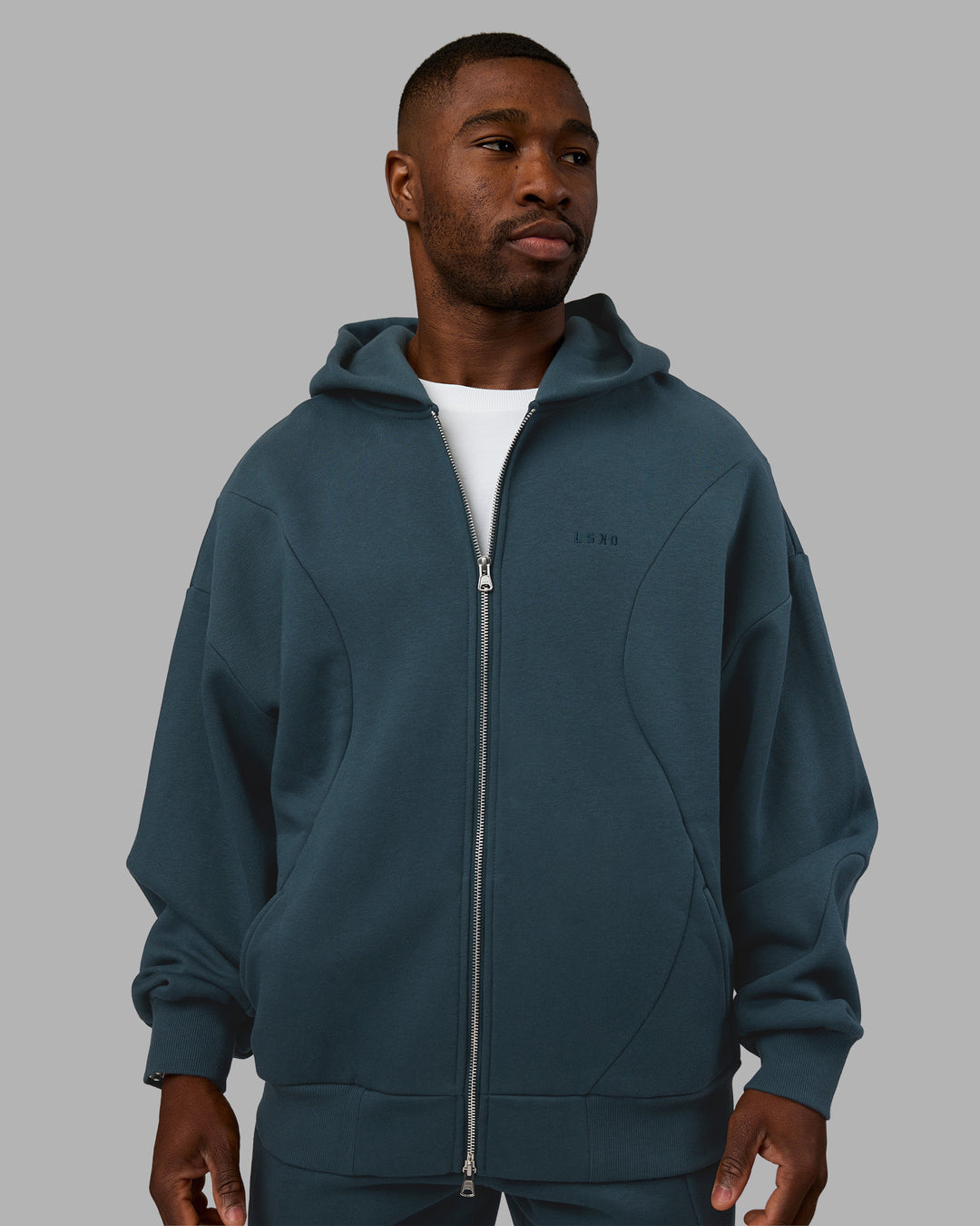 Man wearing Stream Oversized Panel Zip Hoodie - Deep Sea | Model:Sam | Size:L - view 2