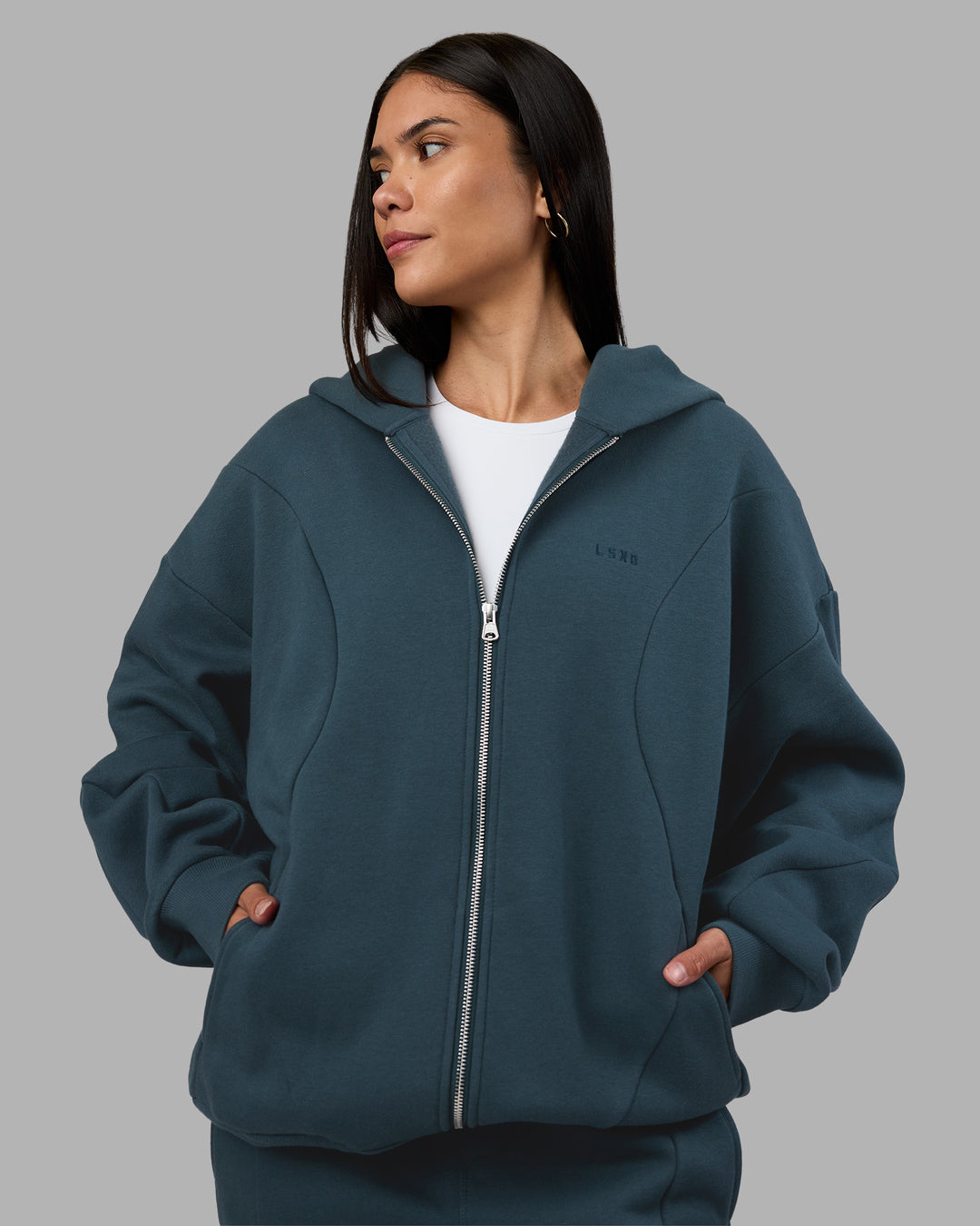 Woman wearing Stream Oversized Panel Zip Hoodie - Deep Sea | Model:Rhiley | Size:L - view 5