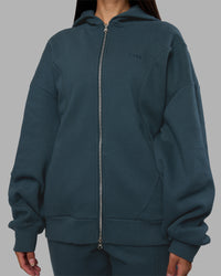 Woman wearing Stream Oversized Panel Zip Hoodie - Deep Sea | Model:Rhiley | Size:L | Thumbnail Index: 7