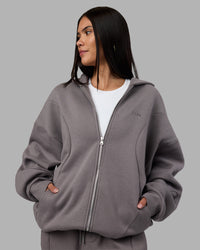 Woman wearing Stream Oversized Panel Zip Hoodie - Storm Front | Model:Rhiley | Size:L | Thumbnail Index: 1