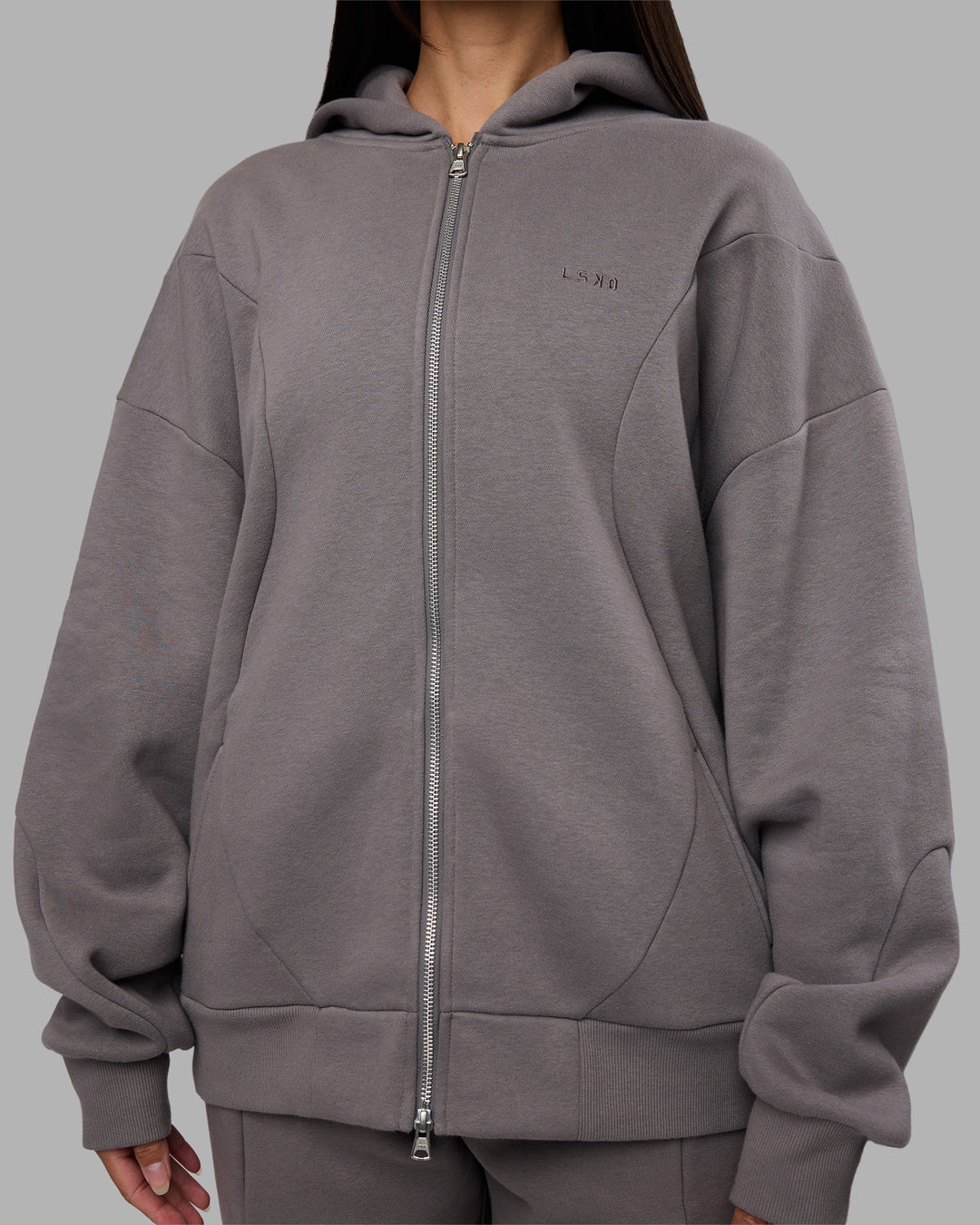 Woman wearing Stream Oversized Panel Zip Hoodie - Storm Front | Model:Rhiley | Size:L - view 7